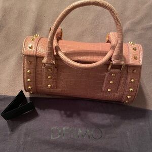 Desmo pink leather hand bag with gold studs